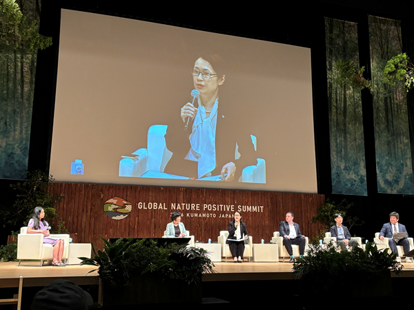 Yuko Tsutsui speaking at the panel discussion (The fourth from the right)