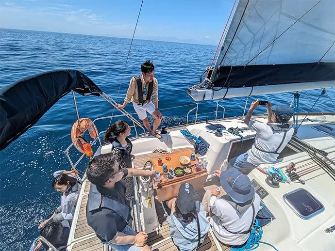 Yacht team members during a cruise 