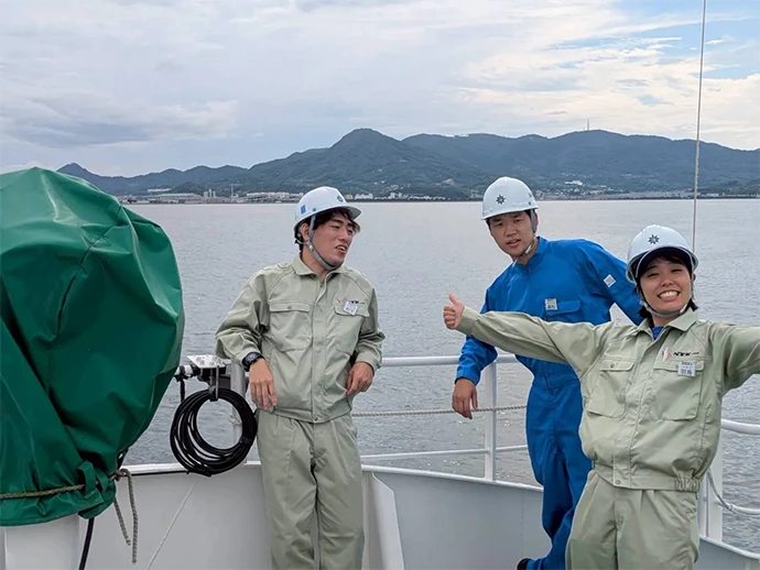Classmates at Marine Technical College — peers and friendly rivals (Hatori, far right)