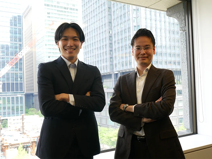 日本郵船株式会社 技術開発グループ　プロジェクトエンジニアリングチーム 前田晃佑（左）小大塚直樹（右） 